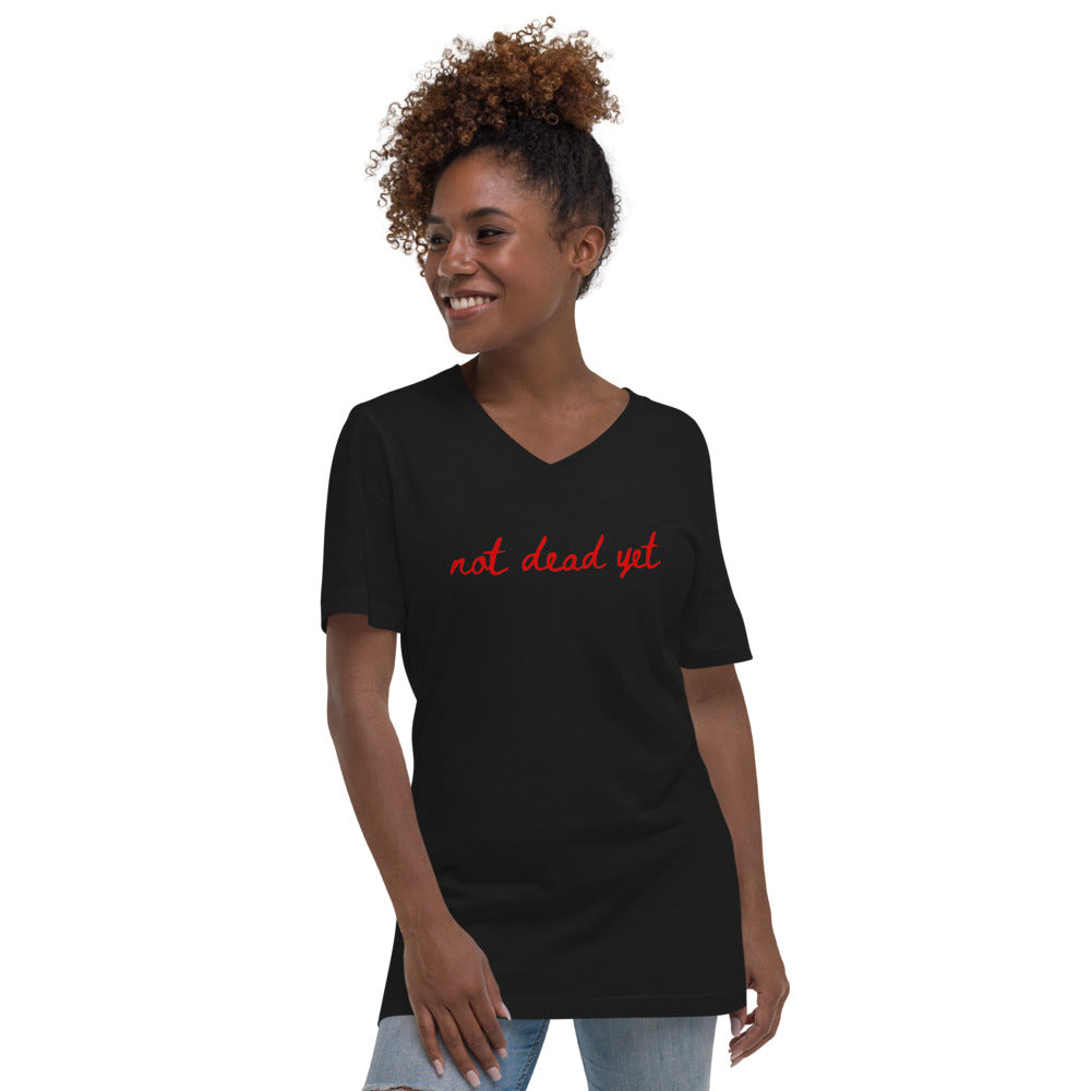 Not dead yet Short Sleeve V-Neck T-Shirt with Red Ink in Black or White (Bella + Canvas)